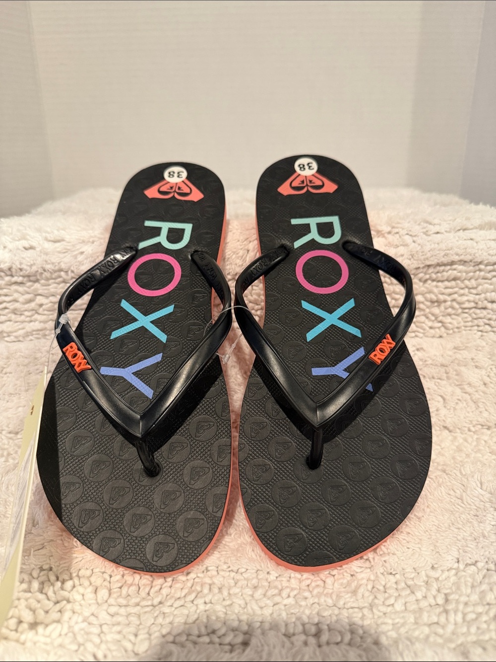 Roxy Black Flip Flops with Teal Pink and Purple Logo